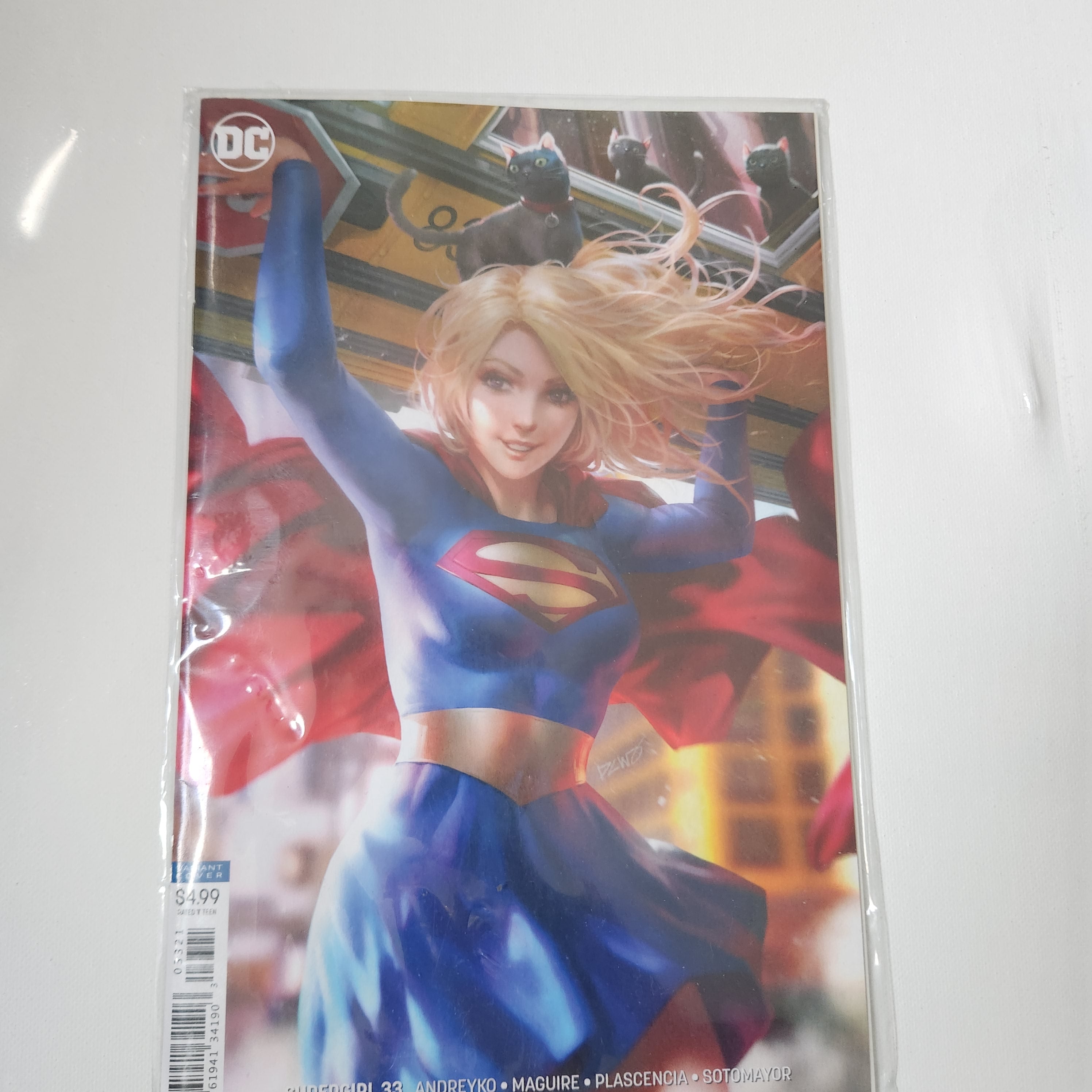 Comic book cover featuring a superhero with a colorful costume on a white background